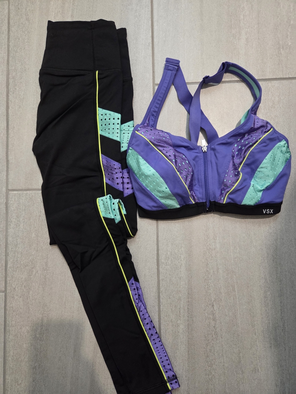 VSX Purple and Teal Zip-Front Sports Bra with Black Leggings